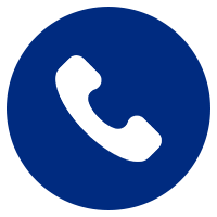 A blue and white telephone sign on a green background